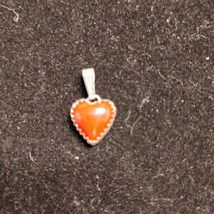 Sterling marked 925 Coral colored heart pendant